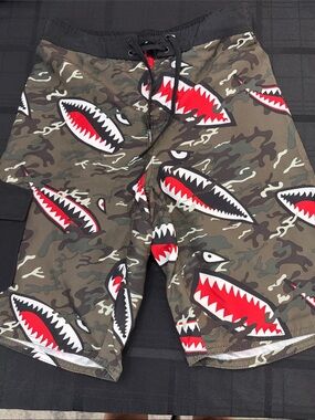 Hang Ten Men's Camo Board Shorts with Red Shark-Mouth Graphics